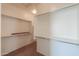 Spacious walk-in closet with ample shelving and hanging space at 36255 W Marin Ave, Maricopa, AZ 85138