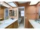 Neutral bathroom with double sinks, and an enclosed toilet for added privacy at 365 Leisure World --, Mesa, AZ 85206