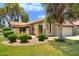 Charming single-story home featuring a well-maintained yard and a private front patio at 365 Leisure World --, Mesa, AZ 85206