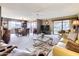 Comfortable living space with fan, large windows, and seamless transition to dining at 365 Leisure World --, Mesa, AZ 85206