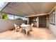 Outdoor patio with overhead covering, table and chairs at 365 Leisure World --, Mesa, AZ 85206