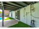 Beautiful backyard featuring artificial turf, covered patio, and swimming pool at 3710 E Altadena Ave, Phoenix, AZ 85028