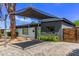 Stylish single-story home with a carport, modern design, and neat, manicured landscaping at 3710 E Altadena Ave, Phoenix, AZ 85028