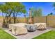 Cozy patio area with comfortable seating, perfect for enjoying the outdoors in a private and relaxing setting at 3710 E Altadena Ave, Phoenix, AZ 85028