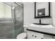 Modern bathroom featuring a glass shower, sleek vanity, and updated fixtures at 3723 W Columbine Dr, Phoenix, AZ 85029