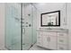 Modern bathroom features a glass-enclosed shower with elegant tile work at 3808 E Fairmount Ave, Phoenix, AZ 85018