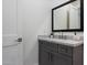 Elegant bathroom features a stylish vanity with a marble countertop and modern faucet at 3808 E Fairmount Ave, Phoenix, AZ 85018