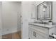 Stylish bathroom features a marble countertop and modern vanity with hardware at 3808 E Fairmount Ave, Phoenix, AZ 85018
