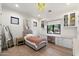 Bright bedroom features built-in cabinets, a chandelier, and plenty of natural light at 3808 E Fairmount Ave, Phoenix, AZ 85018