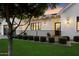 Charming front yard with manicured landscaping, a cozy porch and a welcoming entrance at 3808 E Fairmount Ave, Phoenix, AZ 85018