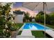 Inviting backyard pool and lounge area offering a serene and relaxing outdoor experience at 3808 E Fairmount Ave, Phoenix, AZ 85018