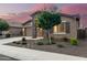 Charming single-Gathering home featuring stone accents, desert landscaping, and a two-car garage at 3894 E Dogwood Pl, Chandler, AZ 85286