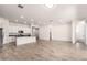Spacious open floor plan featuring a modern kitchen, living area, and lots of natural light at 3894 E Dogwood Pl, Chandler, AZ 85286