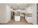 Bright kitchen featuring white cabinetry, stainless appliances, and a center island at 3931 E Crest Ln, Phoenix, AZ 85050