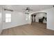 Bright and airy living room with wood floors, ample natural light, and fireplace at 3931 E Crest Ln, Phoenix, AZ 85050