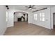 Bright living room with wood floors, lots of natural light, and fireplace feature at 3931 E Crest Ln, Phoenix, AZ 85050