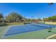 Well-maintained community tennis court with night lighting at 3931 E Crest Ln, Phoenix, AZ 85050