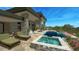 Backyard pool, spa, patio, and lounge area, perfect for entertaining or relaxing in the desert sun at 39878 N 105Th Way, Scottsdale, AZ 85262