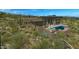 A modern home featuring a pool, spa, and covered patio area, perfect for outdoor living and entertaining at 39878 N 105Th Way, Scottsdale, AZ 85262