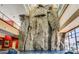 Tall rock climbing wall inside recreation center offers adventure and fitness opportunities for residents of all ages at 40807 N Barnum Way, Anthem, AZ 85086