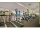 Well-equipped fitness center with modern treadmills, elliptical machines, and climbing wall promotes healthy living at 40807 N Barnum Way, Anthem, AZ 85086