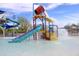 Fun water park area with slides, dumping bucket, and shallow pool offers a refreshing and entertaining experience at 40807 N Barnum Way, Anthem, AZ 85086