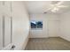 Bedroom with neutral tones, ceiling fan, and a sliding door closet at 41344 W Laramie Rd, Maricopa, AZ 85138