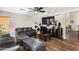 Comfortable living room featuring modern furnishings and a large TV at 4321 E Morenci Rd, San Tan Valley, AZ 85143