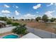 Aerial view of the property's backyard featuring a horse pasture, and partial view of a pool at 453 E Baylor Ln, Gilbert, AZ 85296