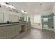 This primary bathroom features dual sinks, soaking tub, and glass-enclosed shower at 453 E Baylor Ln, Gilbert, AZ 85296