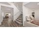 Elegant foyer boasting a staircase with views into the living room at 453 E Baylor Ln, Gilbert, AZ 85296