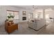 Bright living room features a cozy fireplace and stylish furnishings at 453 E Baylor Ln, Gilbert, AZ 85296