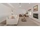 Comfortable living room featuring a shiplap fireplace and neutral decor at 453 E Baylor Ln, Gilbert, AZ 85296