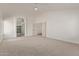 A spacious primary bedroom boasts a large window and convenient ensuite bath access at 453 E Baylor Ln, Gilbert, AZ 85296