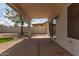 Inviting covered patio overlooks the backyard, blending indoor/outdoor living at 453 E Baylor Ln, Gilbert, AZ 85296