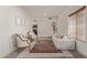 Serene sitting room enhanced by neutral accents and natural lighting at 453 E Baylor Ln, Gilbert, AZ 85296
