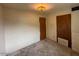 Bedroom featuring a window for natural light and carpeted floors at 4602 N 50Th Ave, Phoenix, AZ 85031