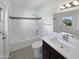 Modern bathroom featuring updated vanity, tiled shower and bathtub, plus natural light at 4607 W Becker Ln, Glendale, AZ 85304
