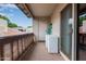 Outdoor balcony with sliding glass doors and laundry machine at 520 N Stapley Dr # 256, Mesa, AZ 85203