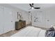 Bedroom featuring serene decor, modern dresser, closet, and natural lighting at 5232 E Dodge St, Mesa, AZ 85205