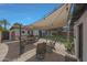 Outdoor patio area with stylish shade covering, perfect for entertainment at 530 W Almeria Rd, Phoenix, AZ 85003