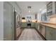 Well-appointed kitchen featuring granite countertops, stainless steel appliances, and a bright, airy atmosphere at 530 W Almeria Rd, Phoenix, AZ 85003
