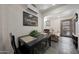 Eat in kitchen area leading to the living room with stylish decor at 530 W Almeria Rd, Phoenix, AZ 85003