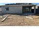 View of a home's exterior, still under construction, featuring stucco and patio doors at 5515 W Piedmont Rd, Laveen, AZ 85339
