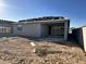 View of a home's exterior, still under construction, featuring stucco and patio doors at 5515 W Piedmont Rd, Laveen, AZ 85339