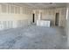 Unfinished living room with drywall reveals the design of a bright, customizable living space during construction at 5515 W Piedmont Rd, Laveen, AZ 85339