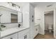 Stylish bathroom with quartz counters, matte black hardware, and plenty of storage at 5526 N 77Th Way, Scottsdale, AZ 85250