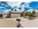 Charming home featuring desert landscaping, palm trees, and a two-car garage in a sunny neighborhood at 5526 N 77Th Way, Scottsdale, AZ 85250