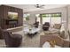 Bright living room featuring cozy seating, a decorative coffee table, and modern decor at 5526 N 77Th Way, Scottsdale, AZ 85250