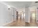 Bright, open-concept home with hardwood floors and white trim at 5526 N 77Th Way, Scottsdale, AZ 85250